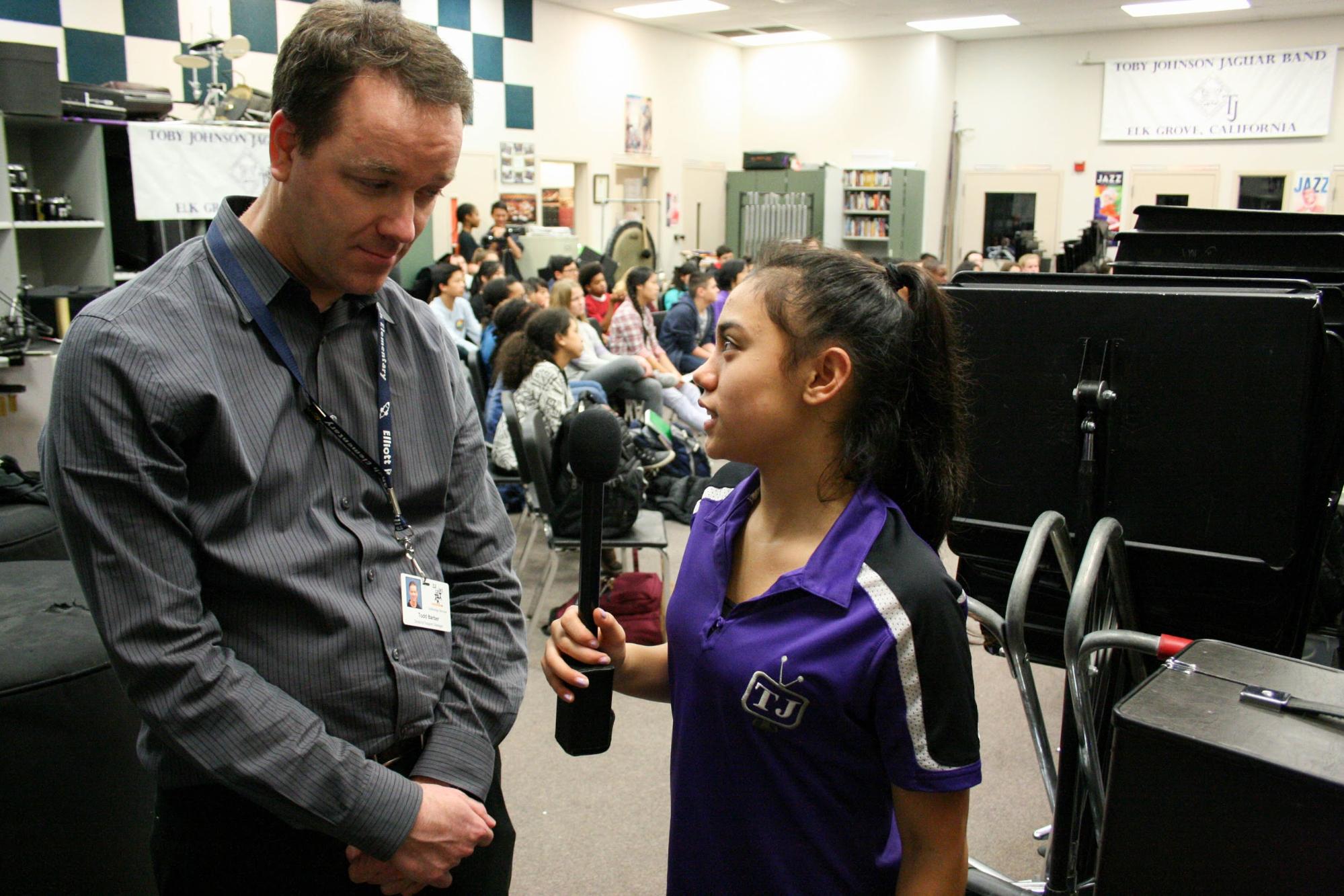 Video production team conducting interviews to learn about the technical set up for the videoconference.