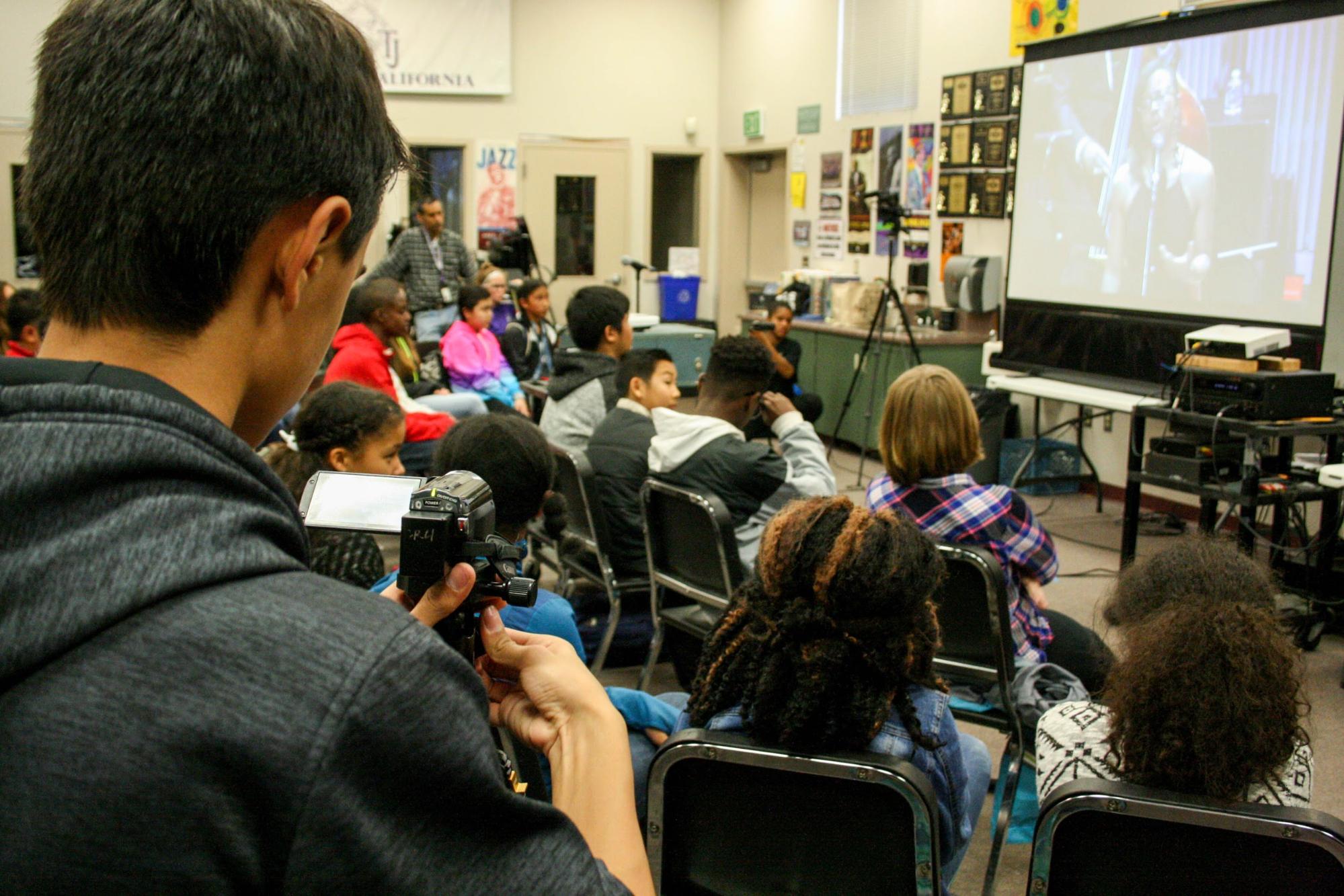 Toby Johnson Middle School video production team captures the event from multiple angles.